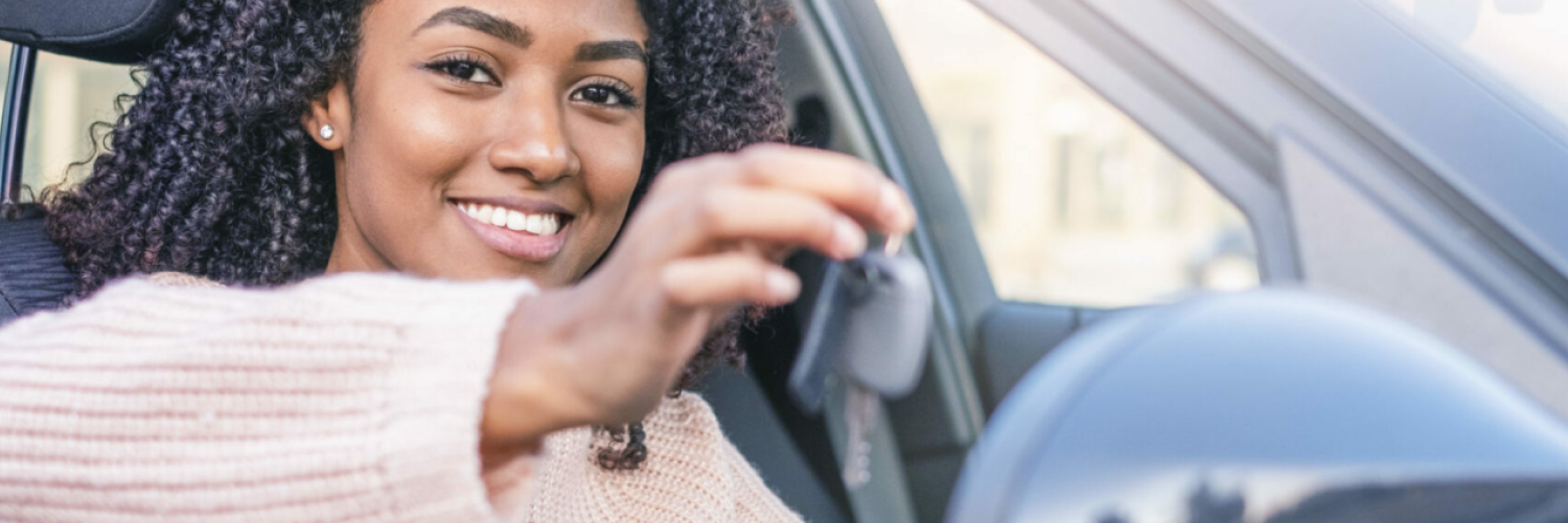 woman holding key arval release business